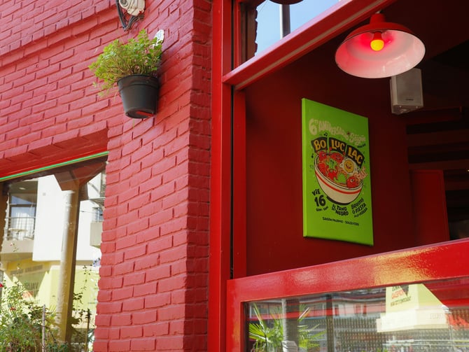 Colorful Mexican cafe storefront with bold signage