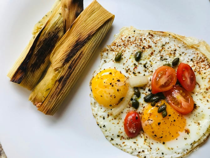 Traditional Mexican breakfast plate with eggs and tortilla
