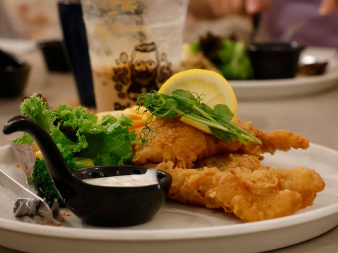 Plate of fried fish and seafood at a casual restaurant